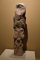 Sculptured stone pole