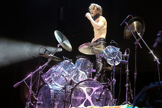 Yoshiki at his drum kit during a 2011 X Japan concert in São Paulo, after the band's reunion in 2007