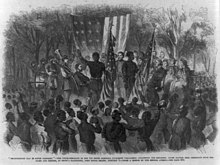 "Emancipation Day in South Carolina" - Soldiers Prince Rivers and Corporal Robert Sutton of the 1st South Carolina (Colored) are presented with the Stars and Stripes at the former John Joyner Smith plantation renamed Camp Saxton "Emancipation Day in South Carolina" - the Color-Sergeant of the 1st South Carolina (Colored) addressing the regiment, after having been presented with the Stars and Stripes, at Smith's LCCN99614128.jpg
