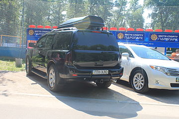 Vanity plate "ПТН-ХЛО", abbreviation of the phrase, on a car in Ukraine