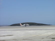 Orosay and the runway at Barra airport