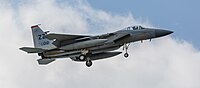 A US Air Force F-15C Eagle, tail number 80-0012, on final approach at Kadena Air Base in Okinawa, Japan