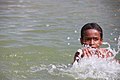 A child swimming and Playing at Eyl canal in an ancient port town in the northeastern Nugal province of Somalia.jpg