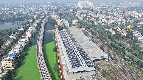 Aerial view of the New Garia Depot (Kavi Subhash Carshed) and the Orange Line viaduct.jpg