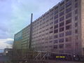 View of the east-northeast (upriver) side of the building from Clark St. and Jefferson Ave. W. The graffiti was new as of April 2011.