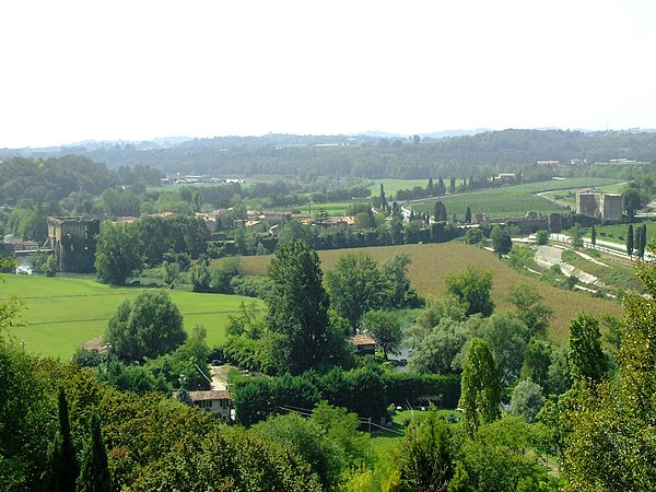 This view shows the western approaches to the Borghetto bridge which is at the far left of the photo. The Mincio can be seen amid the trees in the for