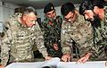 Brig. Gen. Tom Cosentino, examines inventory data with Afghan National Army (6225758502).jpg