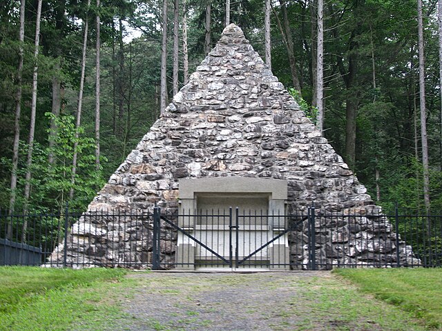 The stone pyramid marking the site of President Buchanan's birth in the park