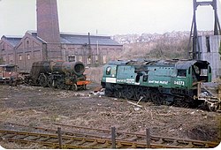 SR Merchant Navy class Shaw Savill (left) with SR Battle of Britain class 249 Squadron (right) at Woodham's Scrapyard in 1984. Bulleid Pacific locomotives at Woodhams Scrapyard Barry.jpg