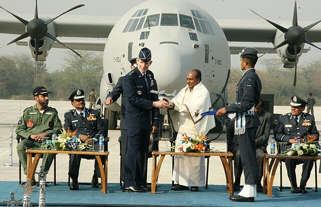 Defence Minister A. K. Antony with 19th Chief of Staff of the United States Air Force Norton Schwartz presenting a model of the C-130J Super Hercules 