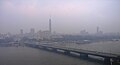 Gezira as seen from Garden City with Qasr Al-Nil Bridge in foreground with morning haze/smog