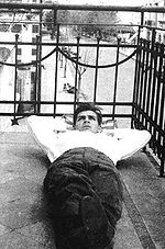 A 20-year-old Ernesto Guevara lying on the balcony of his family's home in Buenos Aires CheOnBalcony.jpg