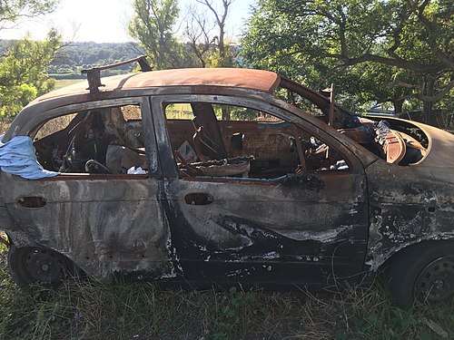 Damaged car in Rome