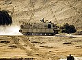 Egyptian military forces armoured vehicle at the brink of the Suez Canal