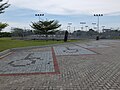 Markierung durch verschiedene Farben des Pflasters, hier bei einem Behindertenparkplatz in Indonesien