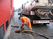 A vacuum truck used to empty septic tanks in Germany Emptying of a tank full with sewage by vacuum truck (2921521126).jpg