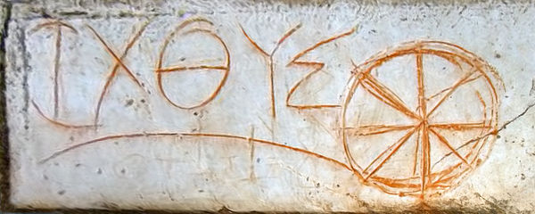 A written Ichthys from ancient Ephesus, with an eight-spoked wheel.