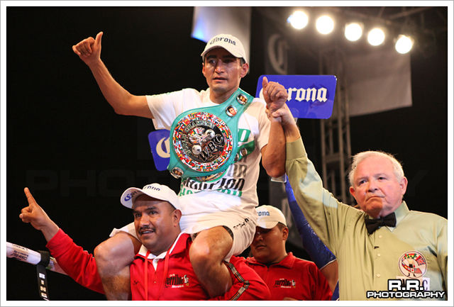 Morales celebrating with the WBC Silver title, 2010