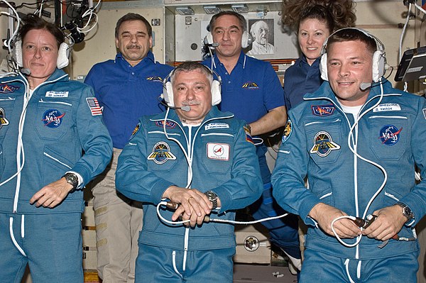 Walker (bottom left) following her arrival aboard the ISS