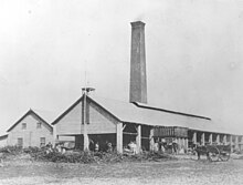 External view of a sugarcane crushing warehouse in Foulden, Queensland, circa 1880.jpg