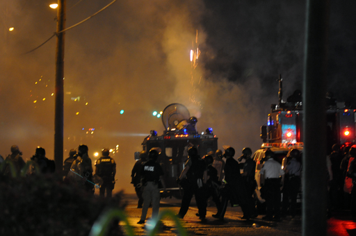 Police attack protesters with chemical weapons. Ferguson, Missouri, August 17,2014. Photo by Loavesofbread. Creative Commons Attribution-Share Alike 4.0 International license.