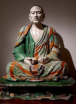 Statue of the luohan Tamrabhadra, one of the group of glazed pottery luohans from Yixian; 10th–13th century; glazed terracotta; height: 123 cm; Guimet Museum (Paris)