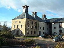 The former Priestfield Maltings, now converted into housing Former maltings at Pitlessie - geograph.org.uk - 96577.jpg