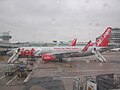 Boeing 737-800 G-GDFC at Manchester Airport Gate 7