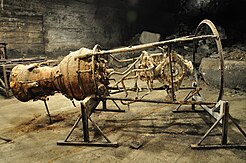 Rusty V-2 rocket engine in the underground production facilities of the camp (2012) Germany, Thuringen, Nordhausen, KZ Dora-Mittelbau (2).JPG