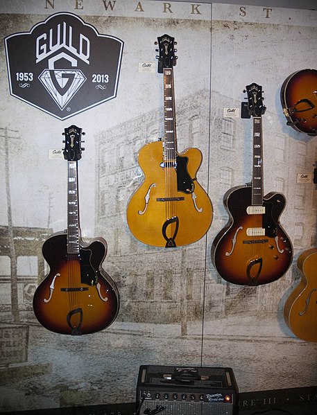 File:Guild Newark St. Collection 1 - A-150 Savoy (Antique Burst), A-150 Savoy (Blonde), X-175 Manhattan (Antique Burst) - NAMM 2013.jpg