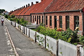 A row of front gardens on the Danish island of Bornholm. Hammershusvej, Sandvig 2010 front gardens.jpg