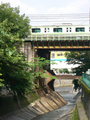 JR Yamanote Line and Seibu Shinjuku Line above Kanda River.PNG