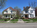 American foursquare house and neighbor