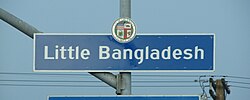 Little Bangladesh Neighborhood sign located at the intersection of New Hampshire and Third Street