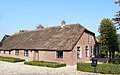 This is an image of rijksmonument number 26251 Farmhouse at Lopikerweg West 6, Lopik.