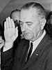 Lyndon B. Johnson taking the oath of office of the President of the United States