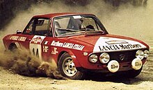 Foto de um Lancia Fulvia se aproximando de uma esquina no Rallye Sanremo 1973.