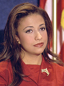 Miss America 2003 Erika Harold at a news conference at the National Press Club discussing her campaign to fight youth violence in 2002 Miss America 2002 Erika Harold.jpg