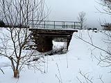 Čeština: Železniční most přes Údolský potok ve vsi Nové Údolí, okres Prachatice, Jihočeský kraj. English: Railway bridge over the Údolský potok (Valley Stream) in the village of Nové Údolí, Prachatice District, South Bohemian Region, Czech Republic.