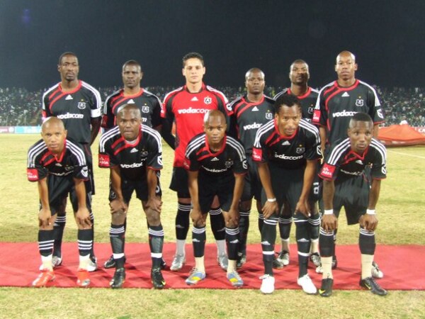 Orlando Pirates starting line-up in 2009. Back row L–R Benson Mhlongo ©, Lucky Lekgwathi, Moeneeb Josephs, Lucas Thwala, Rooi Mahamutsa and Happy Jele