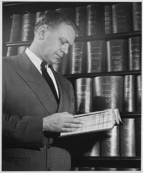 File:Photograph of Representative Gerald R. Ford Paging Through a Bound Copy of 1952 Congressional Hearings - NARA - 186885.tif