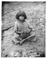 Portrait of a young Havasupai girl making a basket, ca.1900 (CHS-4683).jpg