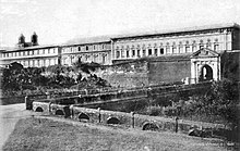 Puerta de Santa Lucia gate is one of the gates of the walled city (Intramuros), Manila. Puerta de Santa Lucia gate of Intramuros in front of Augustinian convento, Manila, Philippines - 1899.jpg