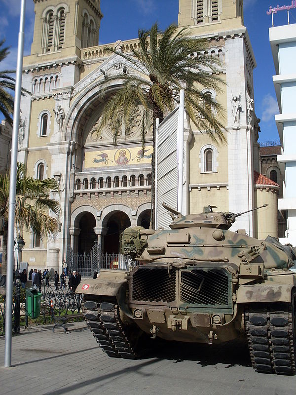A Tunisian army tank deployed in front of the Cathedral of St. Vincent de Paul in Tunis