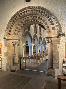 The great Romanesque portal leading from St Mary's Chapel to the main body of the cathedral to the east Romanesque portal in Newport Cathedral.jpg