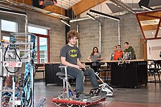 student operating a robot
