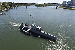 USNS Sea Hunter, an unmanned ocean-going surface vessel is suited for freedom of navigation operations (FONOPS) Sea Hunter gets underway on the Willamette River following a christening ceremony in Portland, Ore. (25702146834).jpg