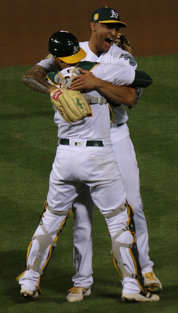 Manaea and Jonathan Lucroy celebrating Manaea's no hitter on April 21, 2018