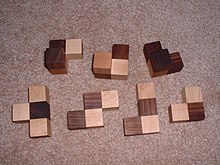 An easier variant of the puzzle, where alternating cubes have different colors Soma-cube-disassembled.jpg