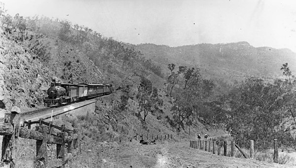 Passenger train ascending the Rack section, 1913. Note that adjacent track, with a grade of 1 in 5 (20%)